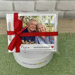 Ein personalisiertes Fotogeschenk mit Erinnerungsfoto und Schokolade