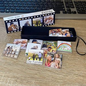 Pralinen in der Verpackung „Film“ mit Fotos.