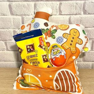 Ingwerlebkuchenhaus-Kissen mit einer Tasche für Süßigkeiten