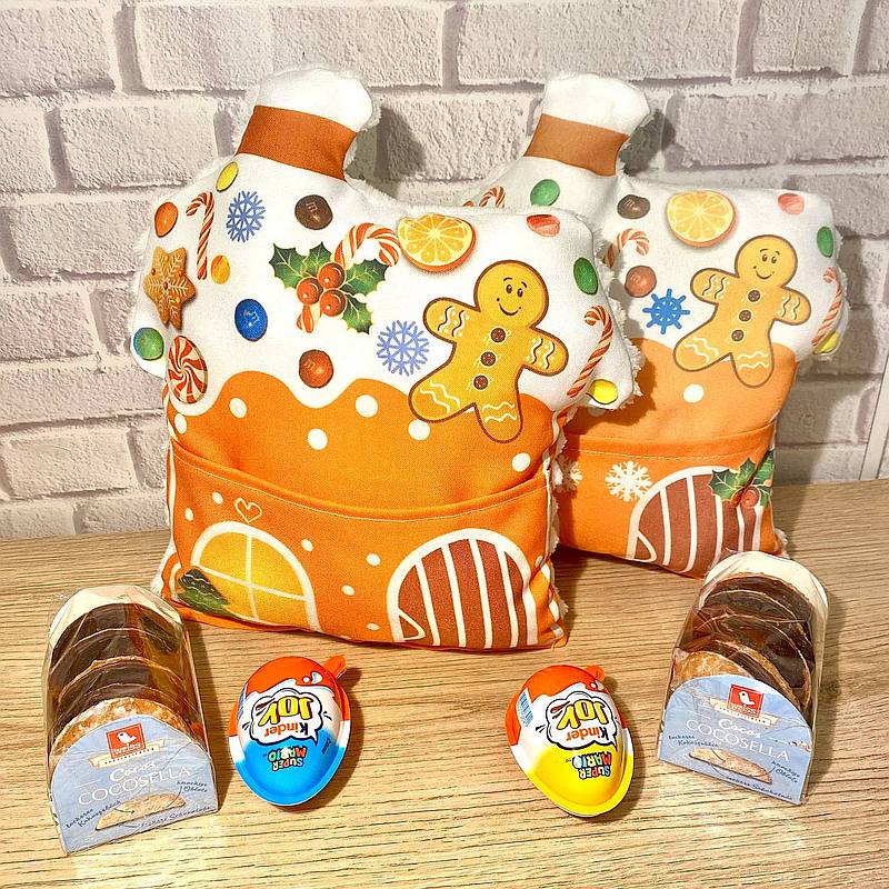 Ingwerlebkuchenhaus-Kissen mit einer Tasche für Süßigkeiten