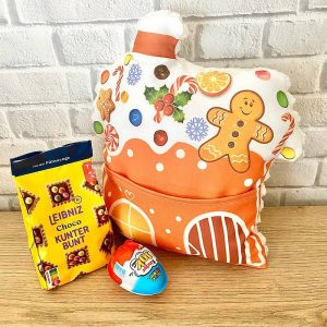 Ingwerlebkuchenhaus-Kissen mit einer Tasche für Süßigkeiten