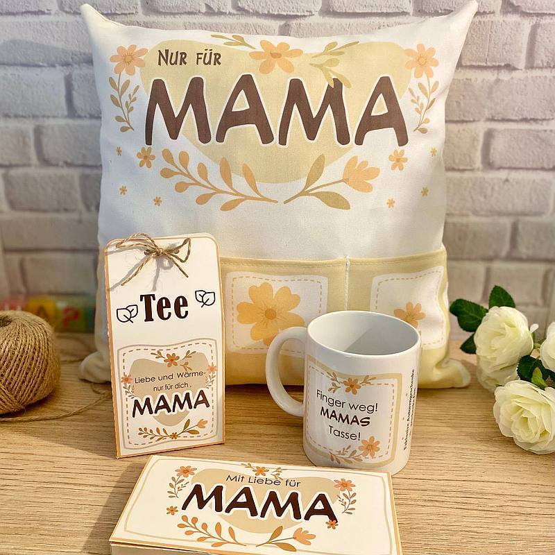 Kissen und Dekoverpackung zum Gestalten eines Geschenks für Mama
